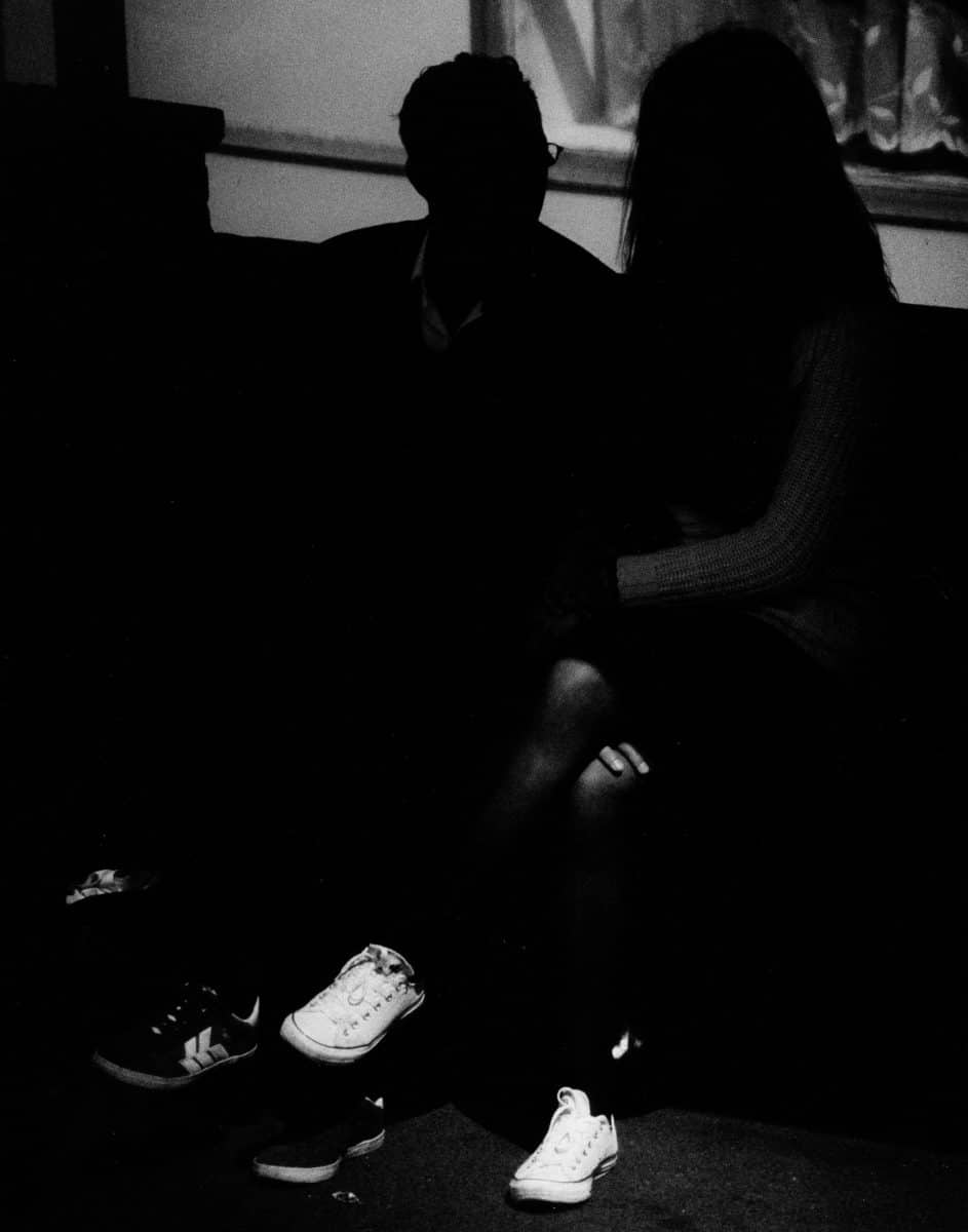 0021 - At the bus stop. Hand printed photograph.